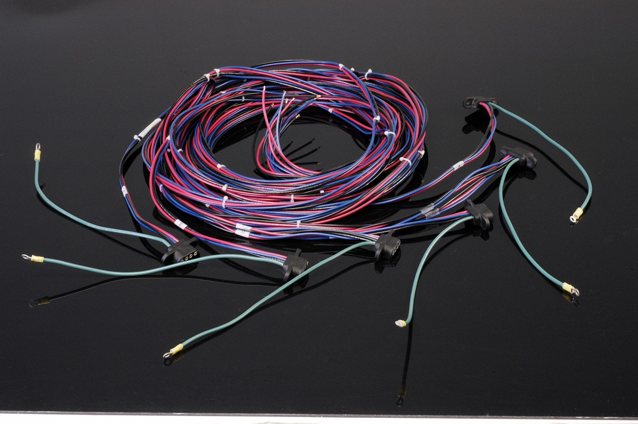 https://www.carriocabling.com/wp-content/uploads/2018/08/carrio-cabling-custom-molded-wire-harness-1.jpg